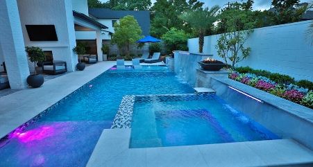 Modern geometric pool with clean lines and zoned areas.